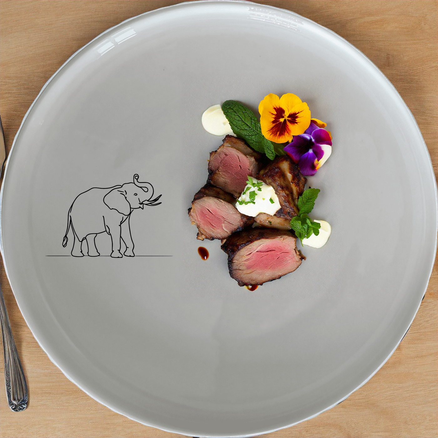 The Wise Elephant Matriarch Dinner Set of 12 features elegant elephant designs on white ceramic plates, perfect for any dining occasion.