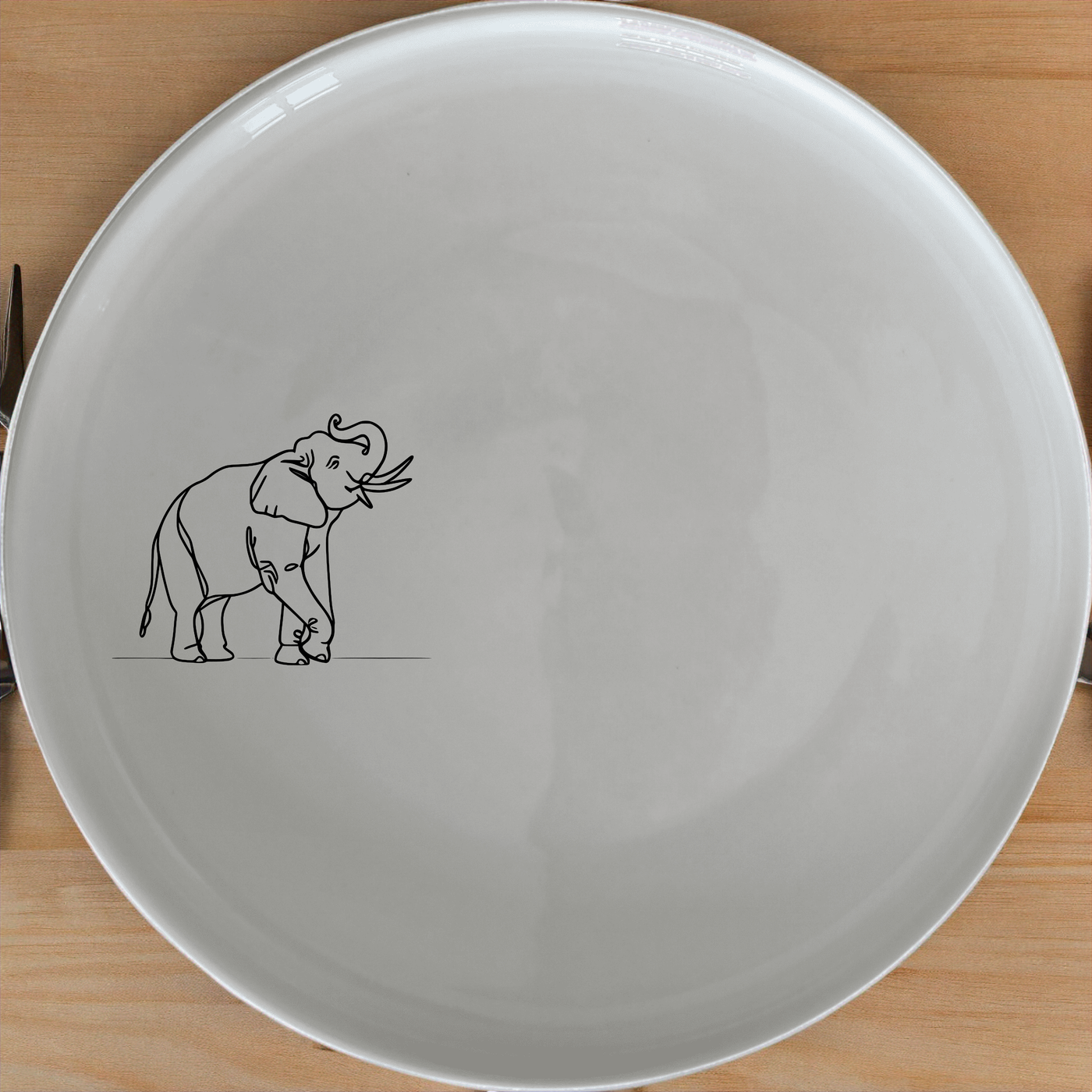 Matriarch Elephant Dinner Plate Set of 4 - Range 1 is a stylish and elegant dinner plate set featuring a unique elephant design, perfect for any dining occasion.