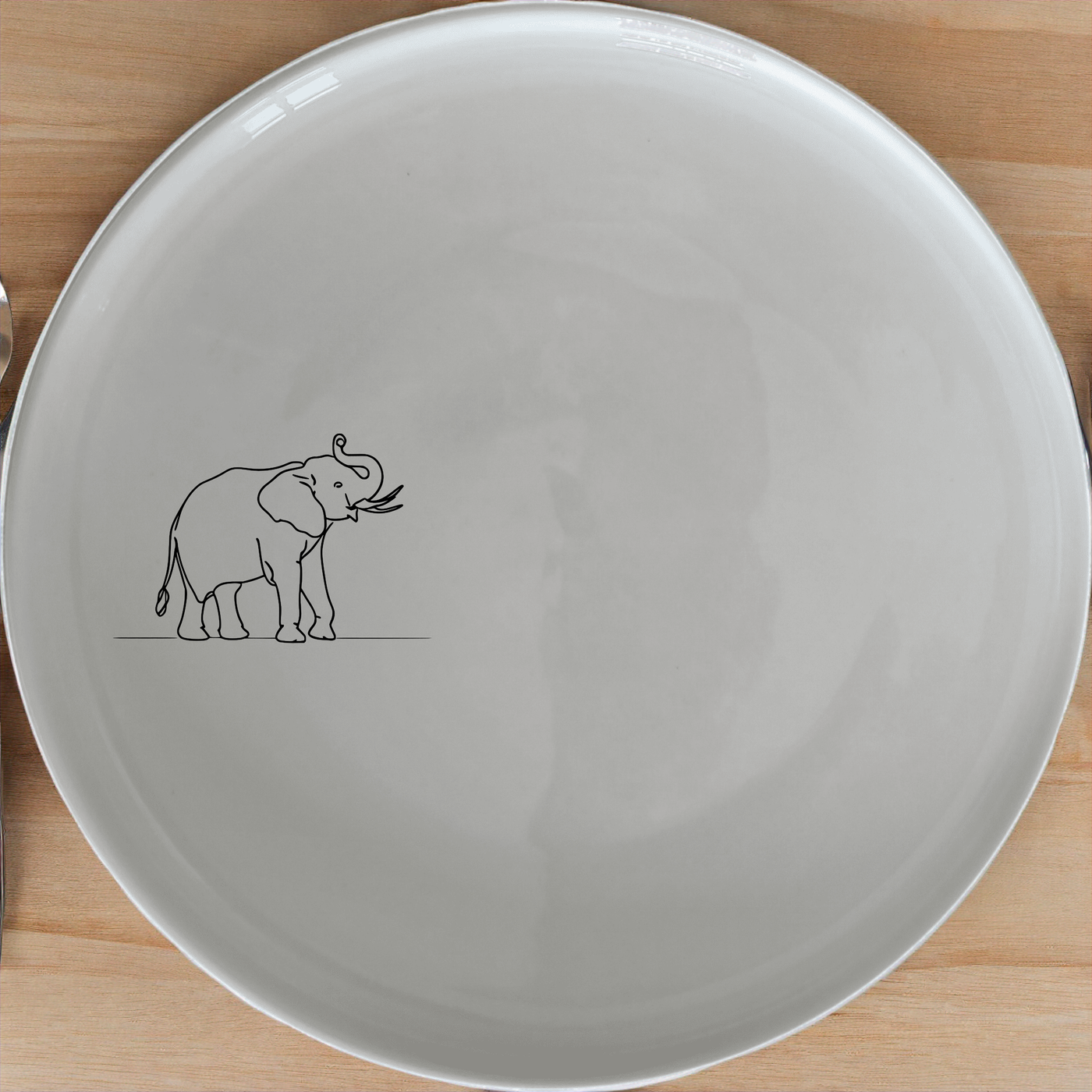 Matriarch Elephant Side Plate Set of 4 - Range 3 adds a touch of elegance to your dining table with its unique design.