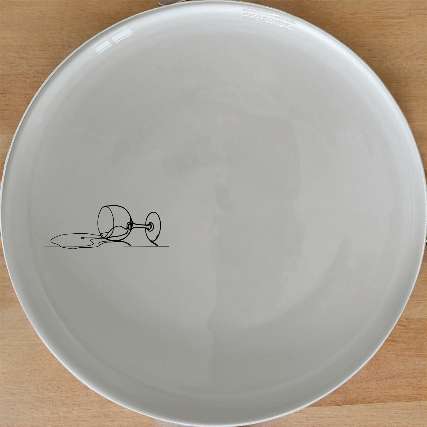 Spilled Glass Wine Side Plate Set of 4 - Range 1 adds a touch of modern art to your dining table with its minimalist design.