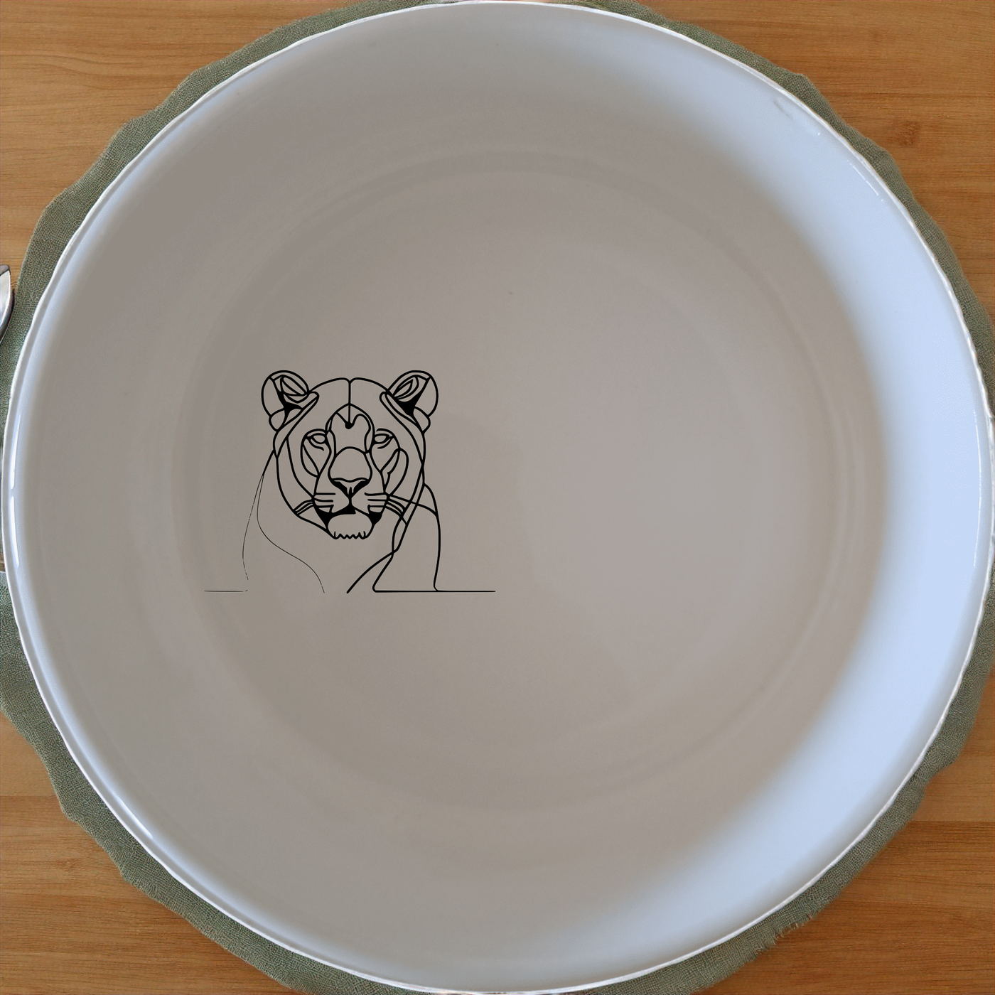 Staring Female Lioness Bowl Set of 4 - Range 2 is a captivating and artistic addition to your dining collection, perfect for those who appreciate unique and stylish tableware.