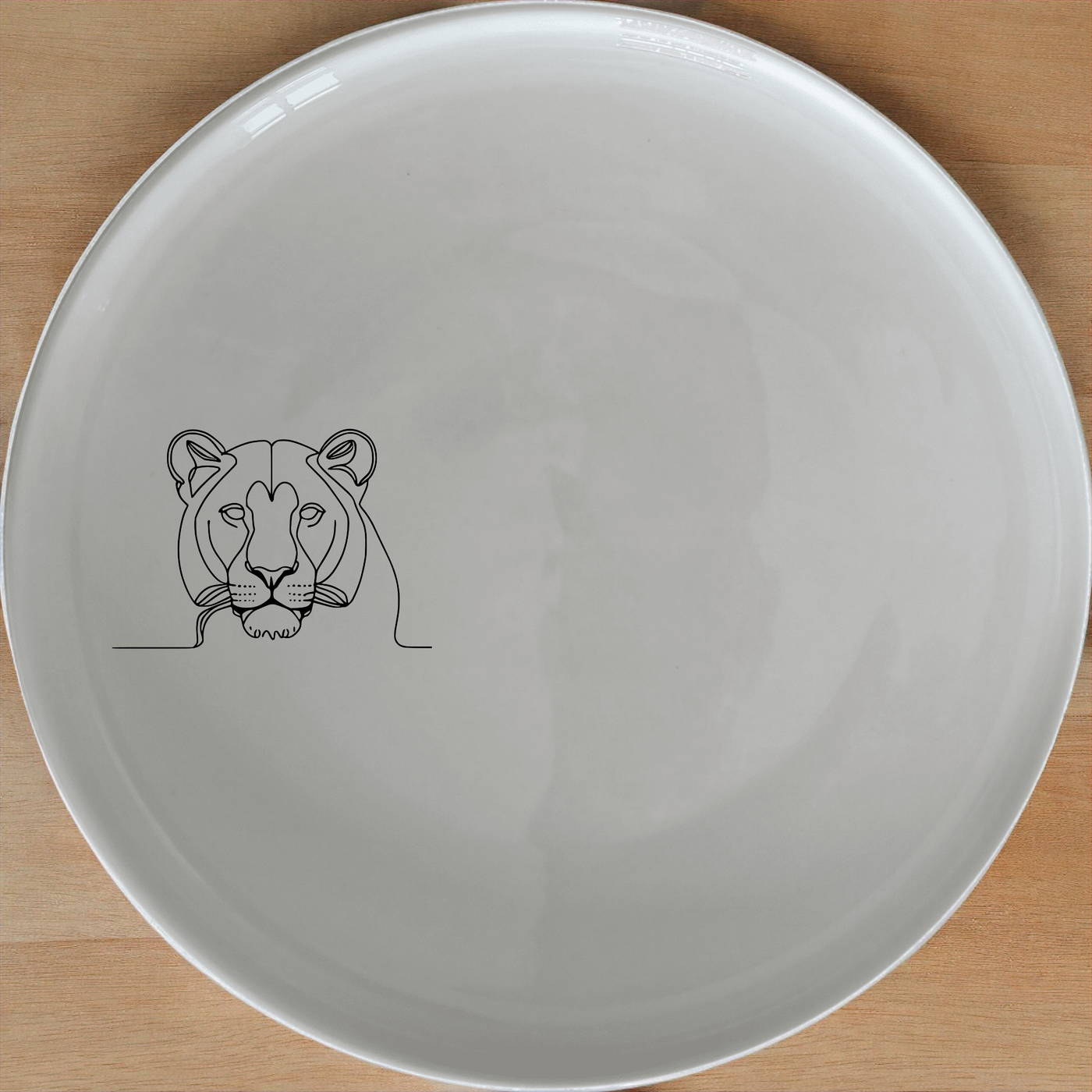 Staring Female Lioness Side Plate Set of 4 - Range 1 is a captivating and stylish addition to any dining set, perfect for modern homes.