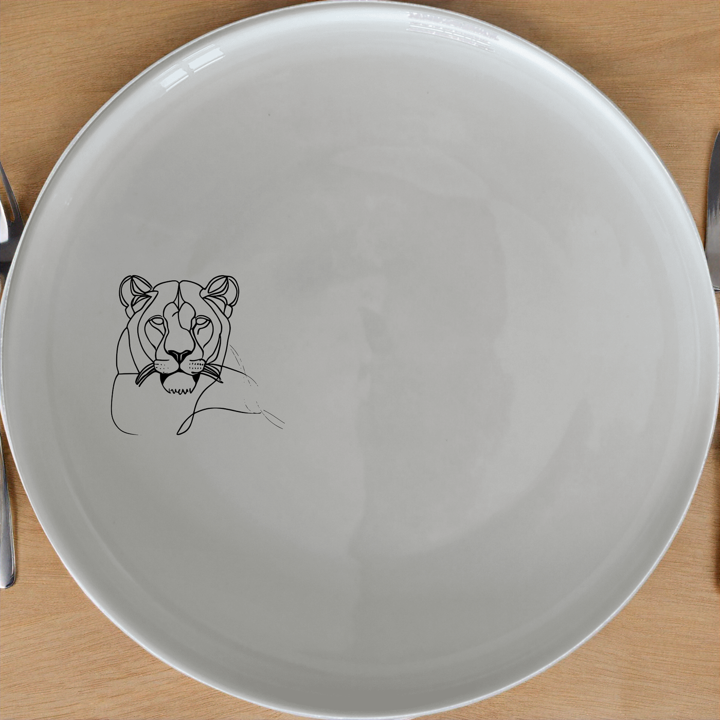 Staring Female Lioness Side Plate Set of 4 - Range 3 is a stylish and elegant addition to any dining set, perfect for modern homes.