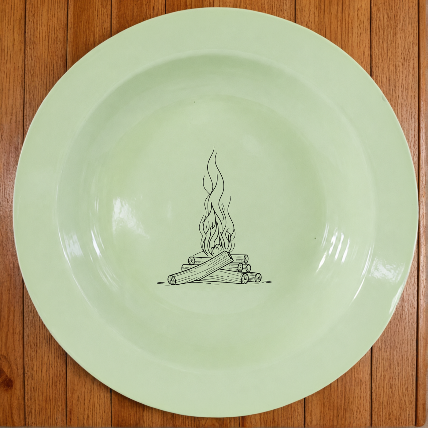 Campfire Wood Dinner Plate Set of 4 in soft sage green enamel with a rustic hand-drawn flame design.